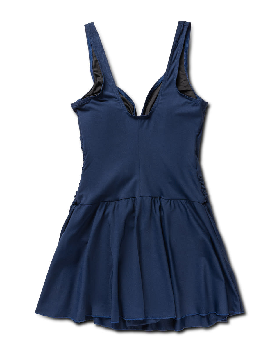 Venezia swim dress with draped waist and small skirt in elegant black – moulded cups and silver clasp detail